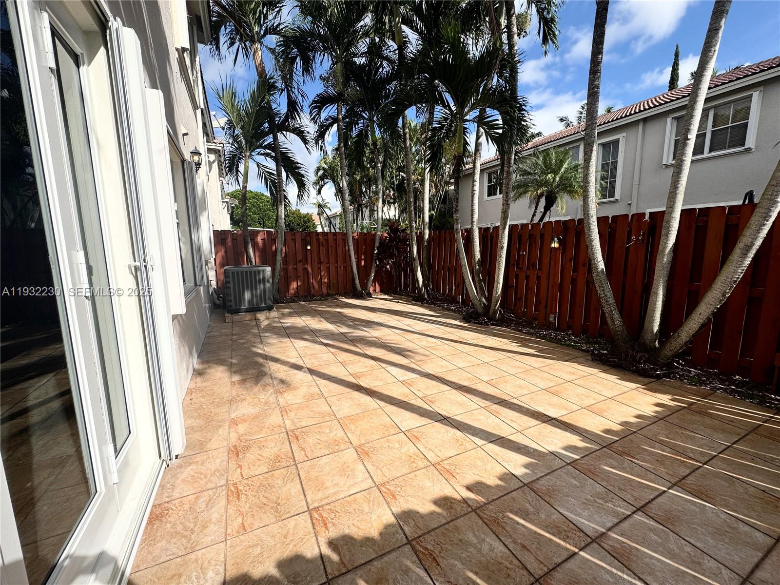 12283 Southwest 123rd Terrace Miami, FL 33186 - Photo 4 of 46 a view of a backyard of the house