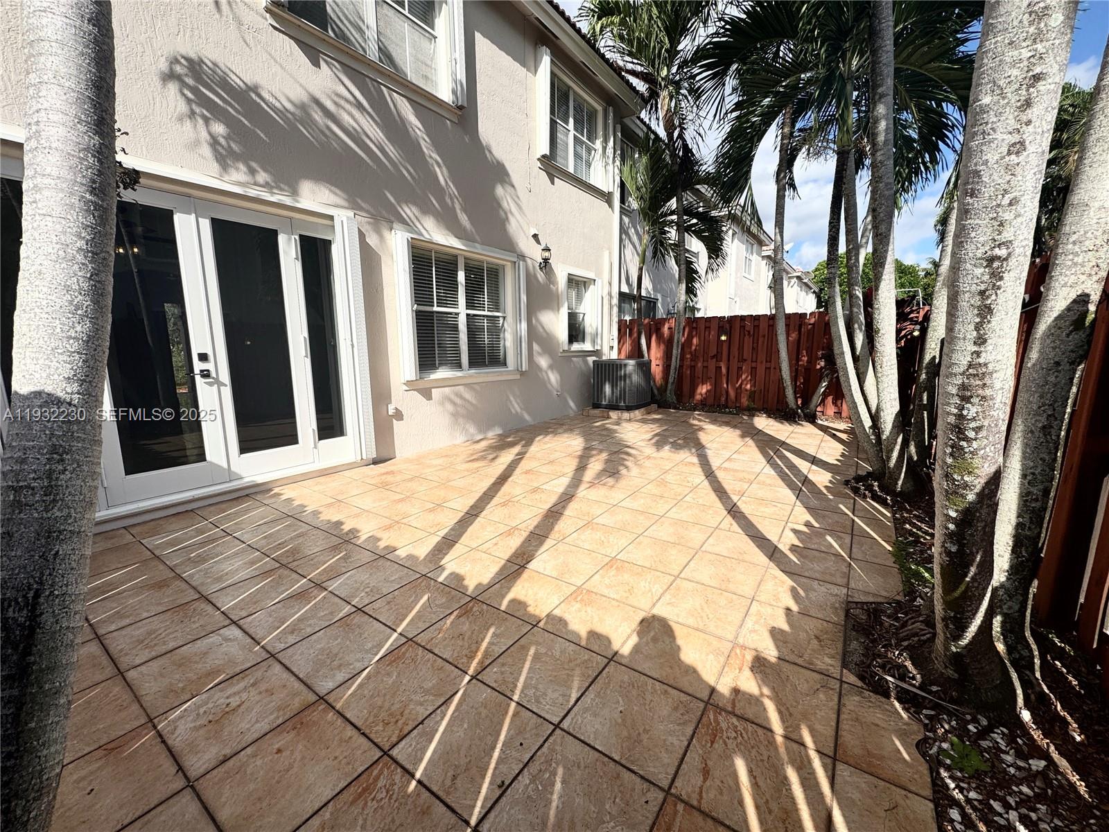 12283 Southwest 123rd Terrace Miami, FL 33186 - Photo 5 of 46 a view of a house with a bed