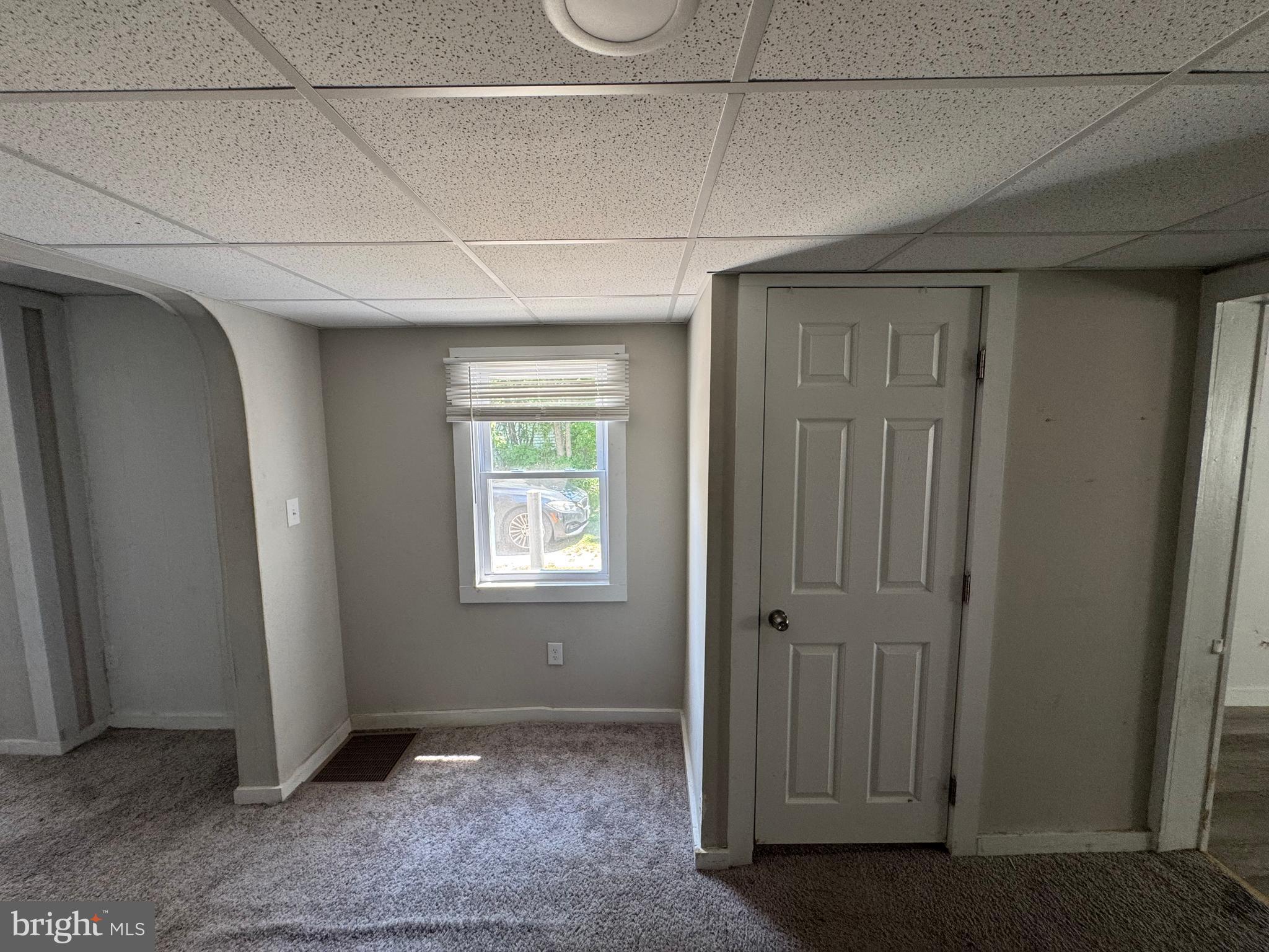 395 Tansboro Road Berlin, NJ 08009 - Photo 9 of 47 an empty room with windows