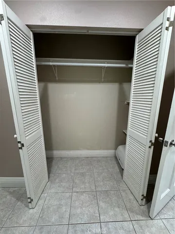 a view of a room with racks on the wall