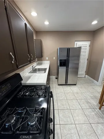 a bathroom with a sink and a stove