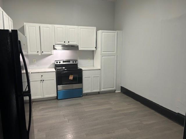 67 Daniel Street Southeast Atlanta, GA 30312 - Photo 17 of 23 a kitchen with a stove and a refrigerator