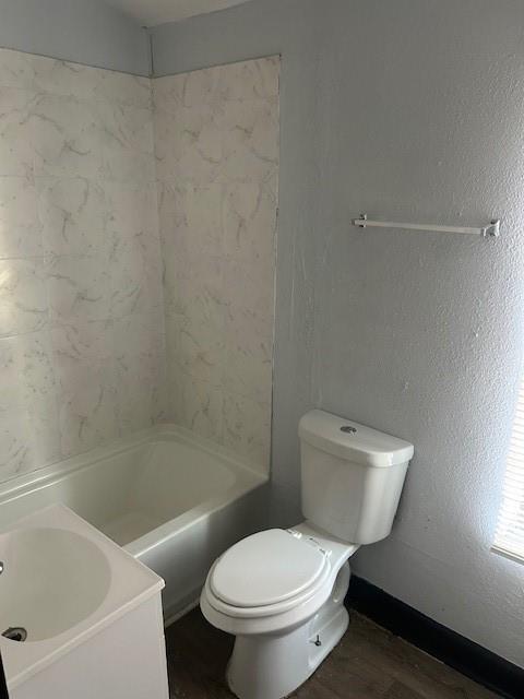 67 Daniel Street Southeast Atlanta, GA 30312 - Photo 21 of 23 a white toilet sitting next to a bath tub