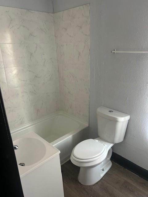 67 Daniel Street Southeast Atlanta, GA 30312 - Photo 22 of 23 a white toilet sitting next to a bath tub