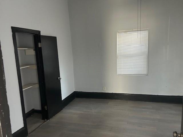 67 Daniel Street Southeast Atlanta, GA 30312 - Photo 5 of 23 an empty room with wooden floor and a window