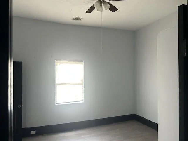 an empty room with a window