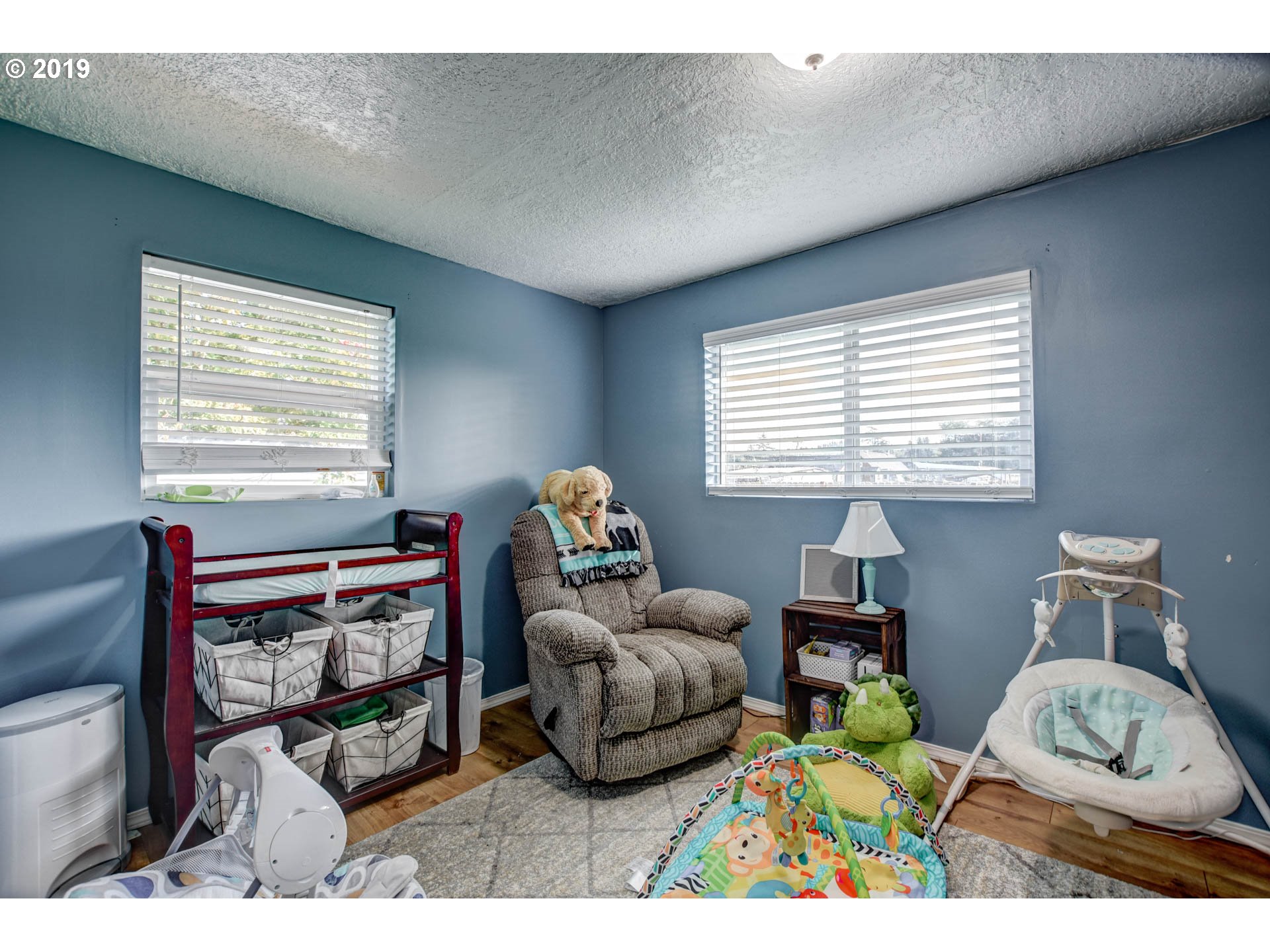 92411 Carnegie Road Astoria, OR 97103 - Photo 17 of 23 a living room with furniture and a window