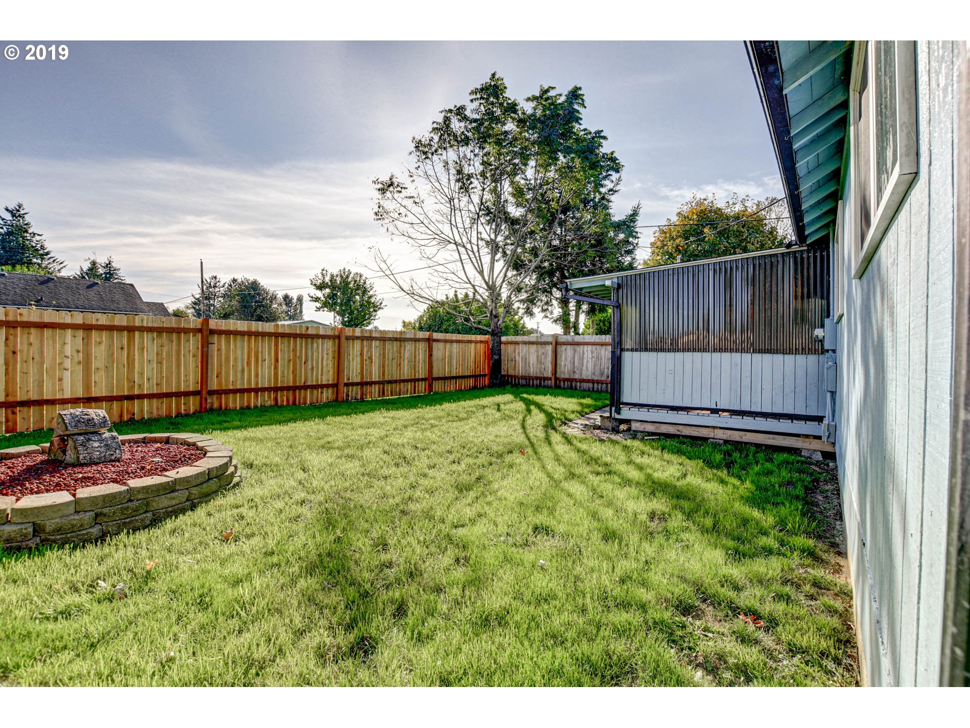 92411 Carnegie Road Astoria, OR 97103 - Photo 21 of 23 a view of backyard with trampoline