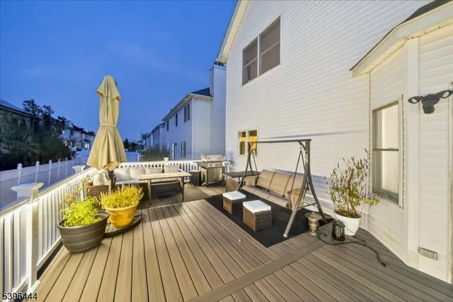 a roof deck view with a seating space