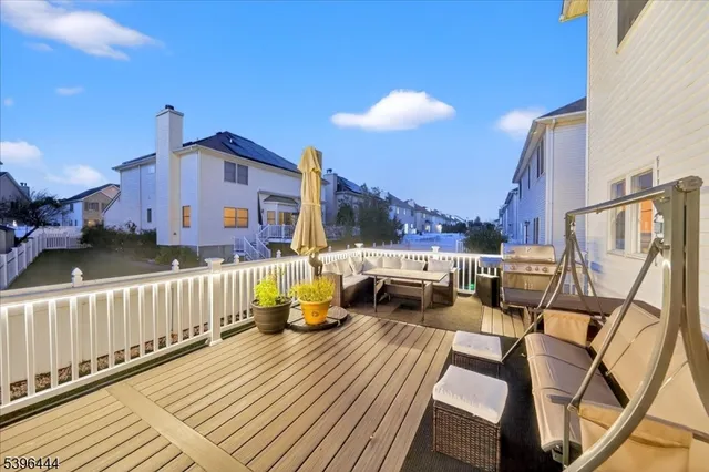 a view of outdoor sitting area with furniture