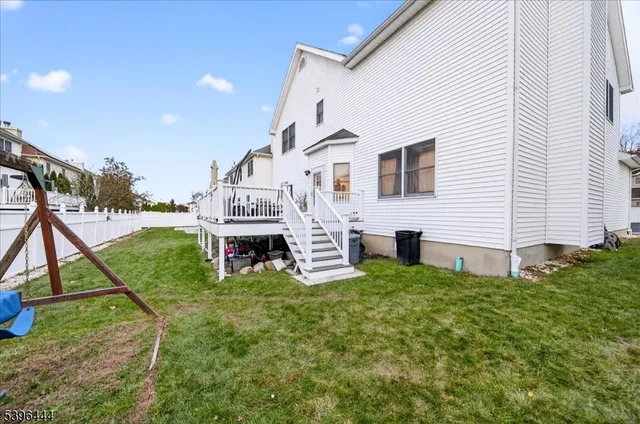 a view of a house with a yard porch and sitting area