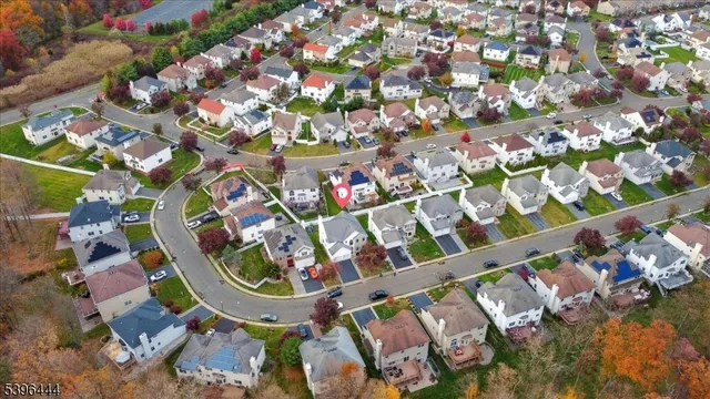 a room with wooden floor and furniture