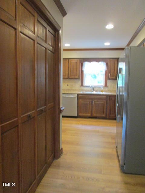200 Raindrop Court Raleigh, NC 27615 - Photo 29 of 61 a view of lot of kitchen and kitchen with wooden floor