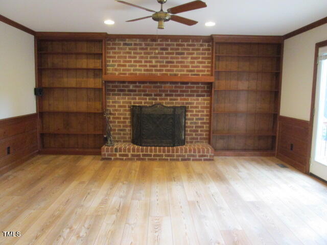 200 Raindrop Court Raleigh, NC 27615 - Photo 33 of 61 a view of an empty room with a fireplace and a window