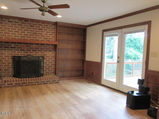 200 Raindrop Court Raleigh, NC 27615 - Photo 34 of 61 a view of an empty room with a fireplace and a window