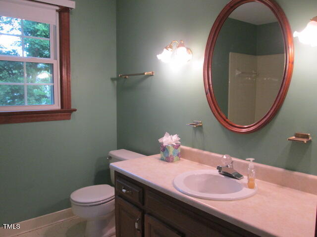 200 Raindrop Court Raleigh, NC 27615 - Photo 38 of 61 a bathroom with a sink and a mirror