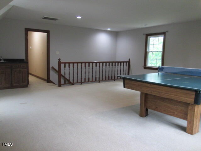 200 Raindrop Court Raleigh, NC 27615 - Photo 40 of 61 a view of an empty room with windows & cabinet