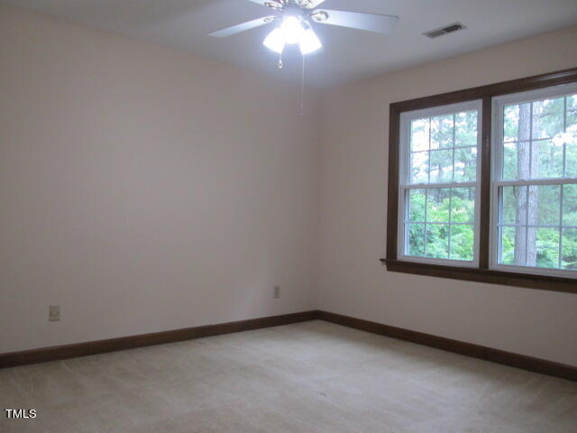 200 Raindrop Court Raleigh, NC 27615 - Photo 48 of 61 an empty room with a window