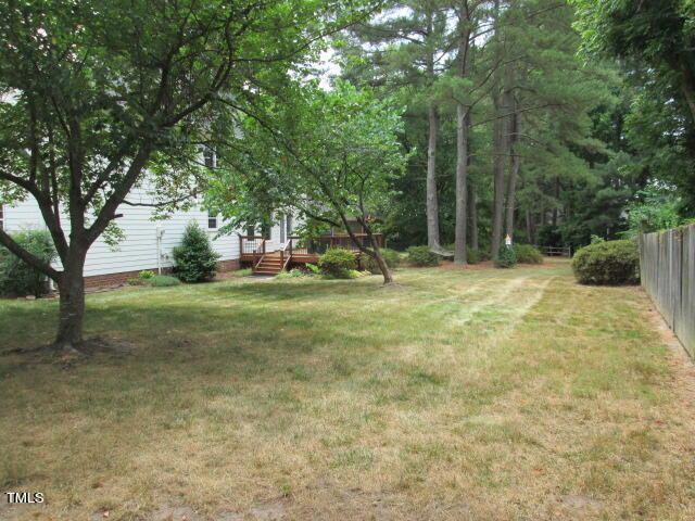 200 Raindrop Court Raleigh, NC 27615 - Photo 5 of 61 a view of a tree in a yard