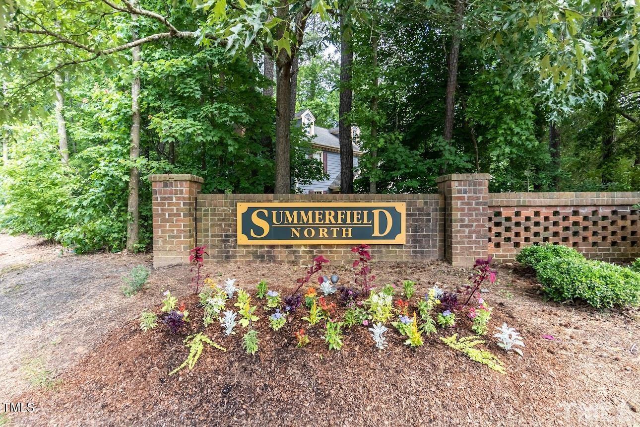 200 Raindrop Court Raleigh, NC 27615 - Photo 58 of 61 a sign broad in front of a road