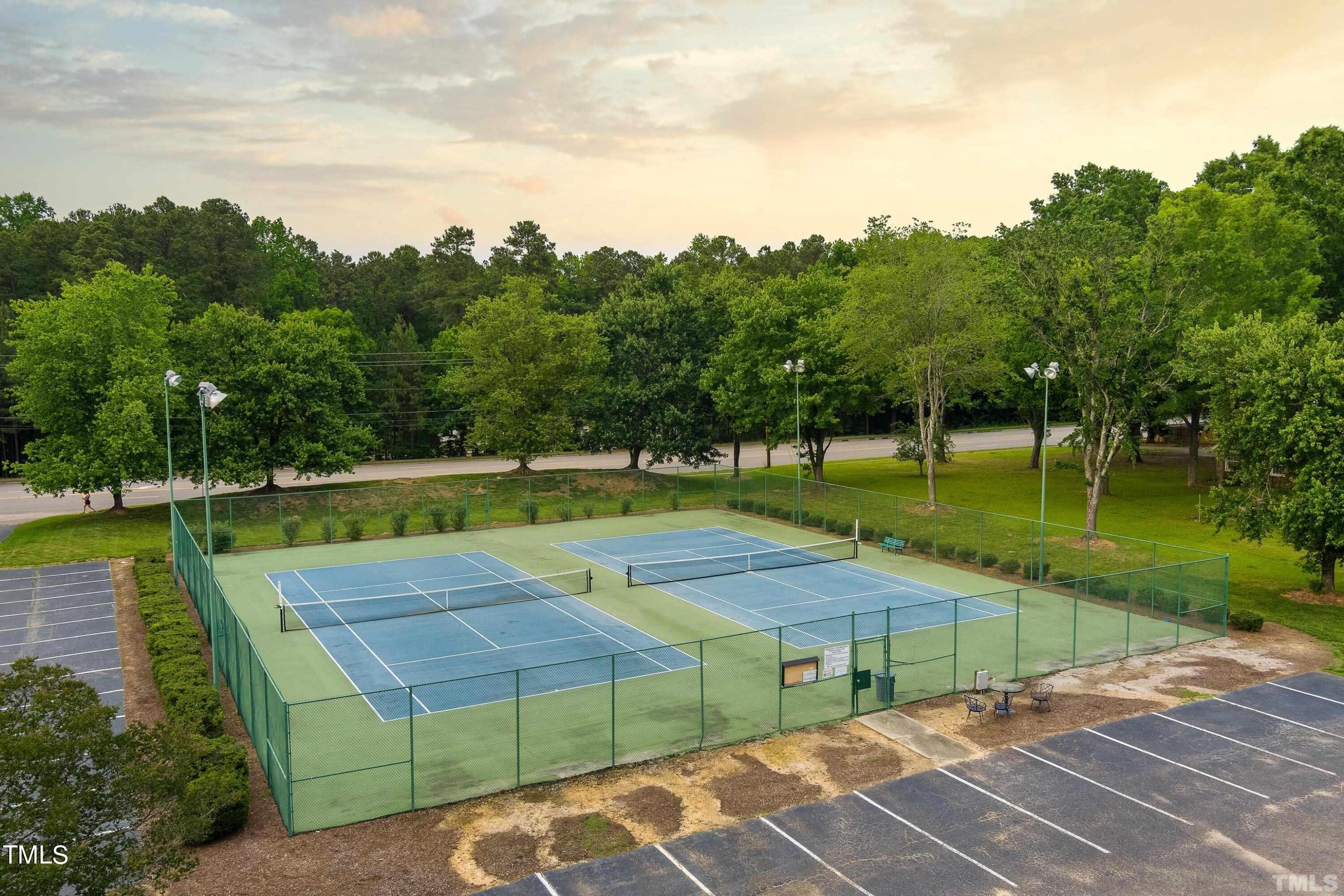 200 Raindrop Court Raleigh, NC 27615 - Photo 60 of 61 an aerial view of a tennis ground with a lawn chairs