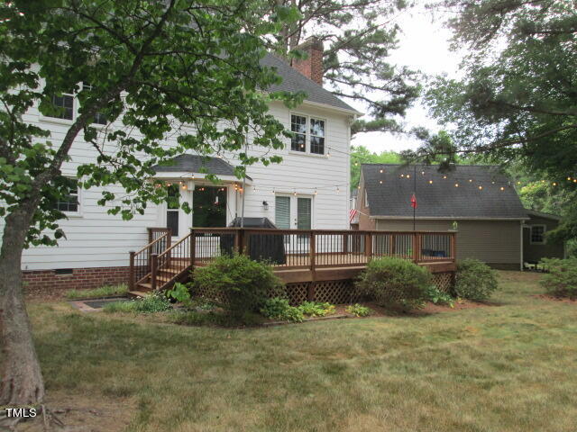 200 Raindrop Court Raleigh, NC 27615 - Photo 10 of 61 a view of a house with backyard and garden