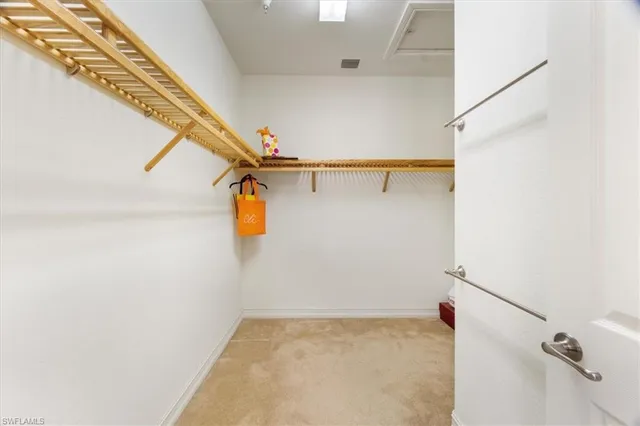 a view of an entryway with wooden floor and windows