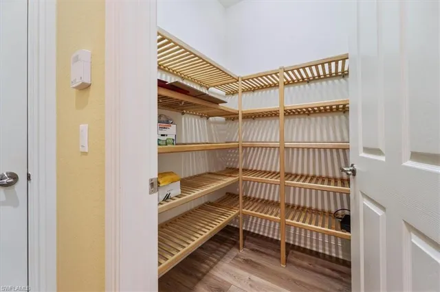 a view of a livingroom with furniture and staircase