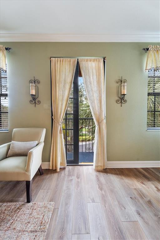9091 Covina Drive South, Unit 6904 Naples, FL 34113 - Photo 39 of 46 a view of a livingroom with furniture and staircase