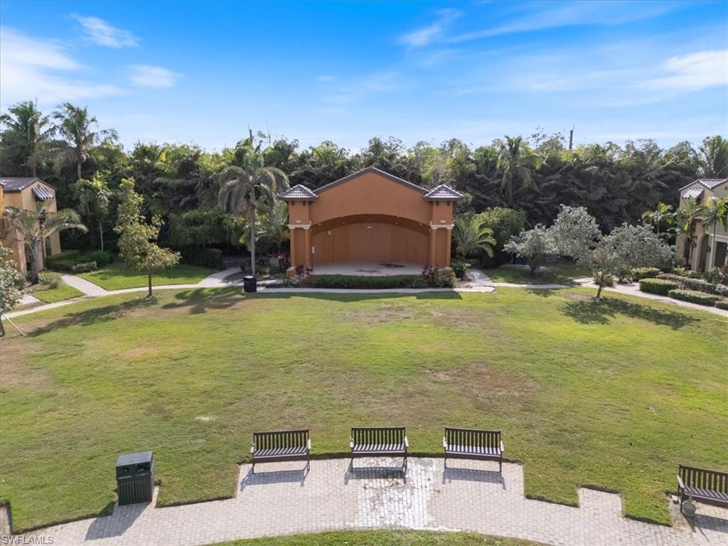 9091 Covina Drive South, Unit 6904 Naples, FL 34113 - Photo 41 of 46 a view of a lake with a mountain view