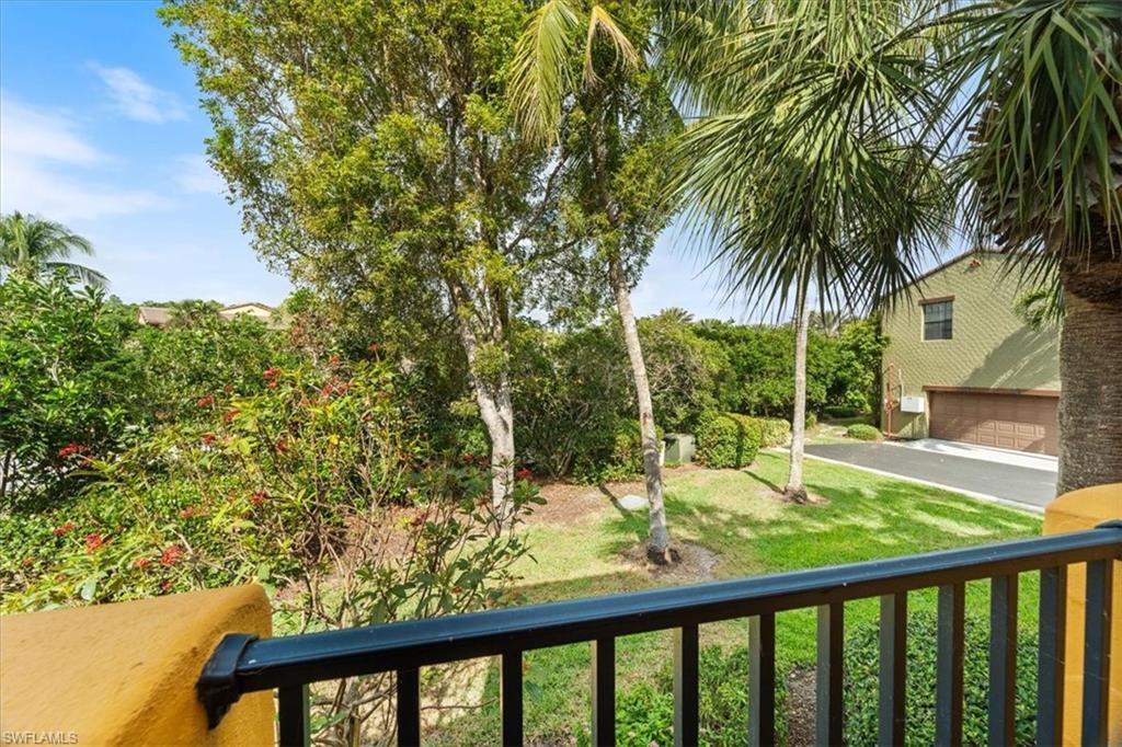 9091 Covina Drive South, Unit 6904 Naples, FL 34113 - Photo 9 of 46 a view of swimming pool from a balcony