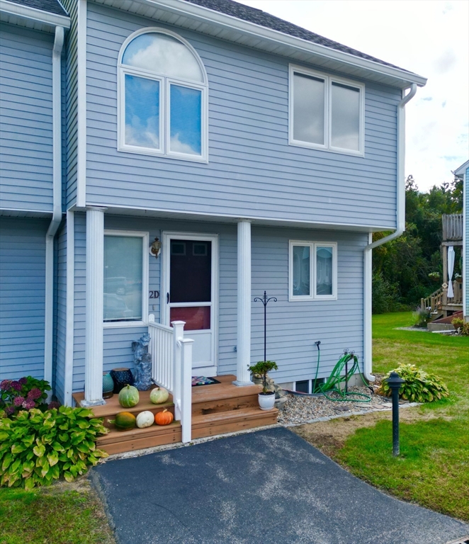 2743 Cranberry Highway, Unit 2D Wareham, MA 02571 - Photo 1 of 37 a front view of a house with garden