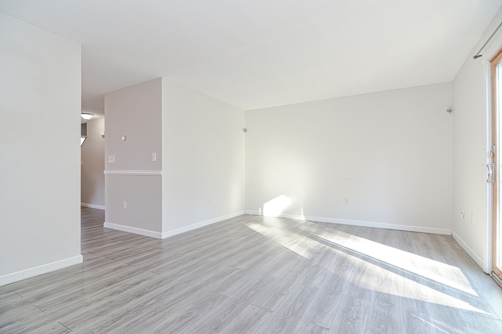 2743 Cranberry Highway, Unit 2D Wareham, MA 02571 - Photo 22 of 37 a view of empty room with wooden floor