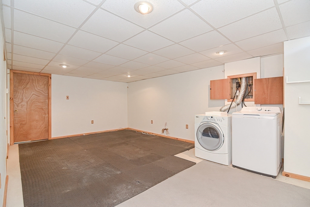 2743 Cranberry Highway, Unit 2D Wareham, MA 02571 - Photo 31 of 37 a utility room with dryer and washer
