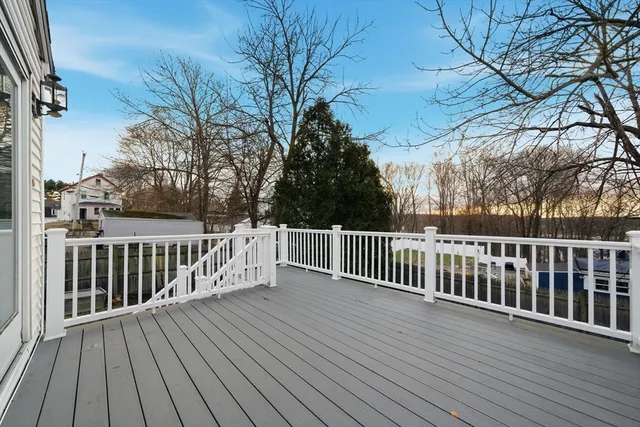 a view of a house with wooden stairs