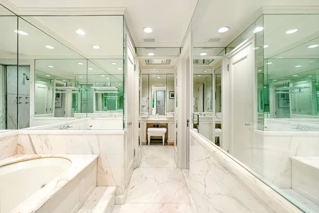 a living room with furniture and windows