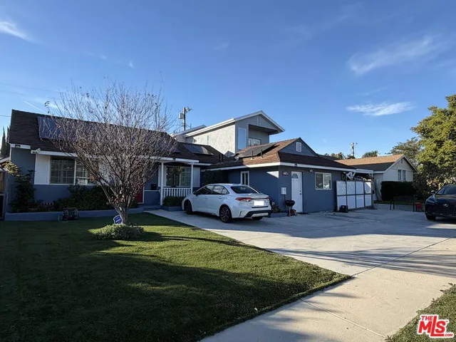 a view of a house with a big yard