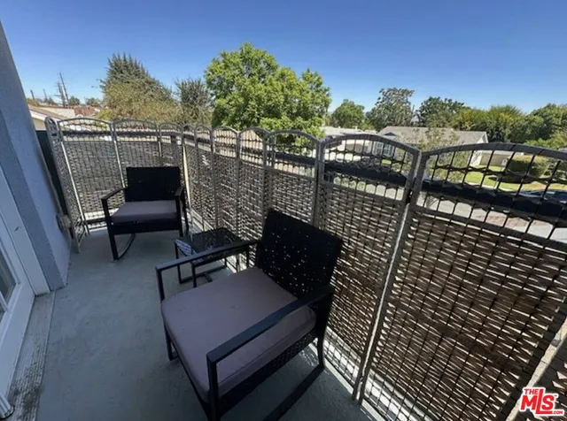 a stove top oven sitting inside of a kitchen