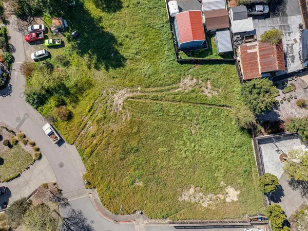 a view of a lake with a yard