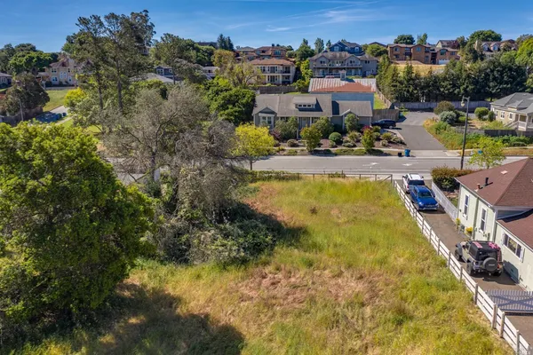 an aerial view of residential house with outdoor space