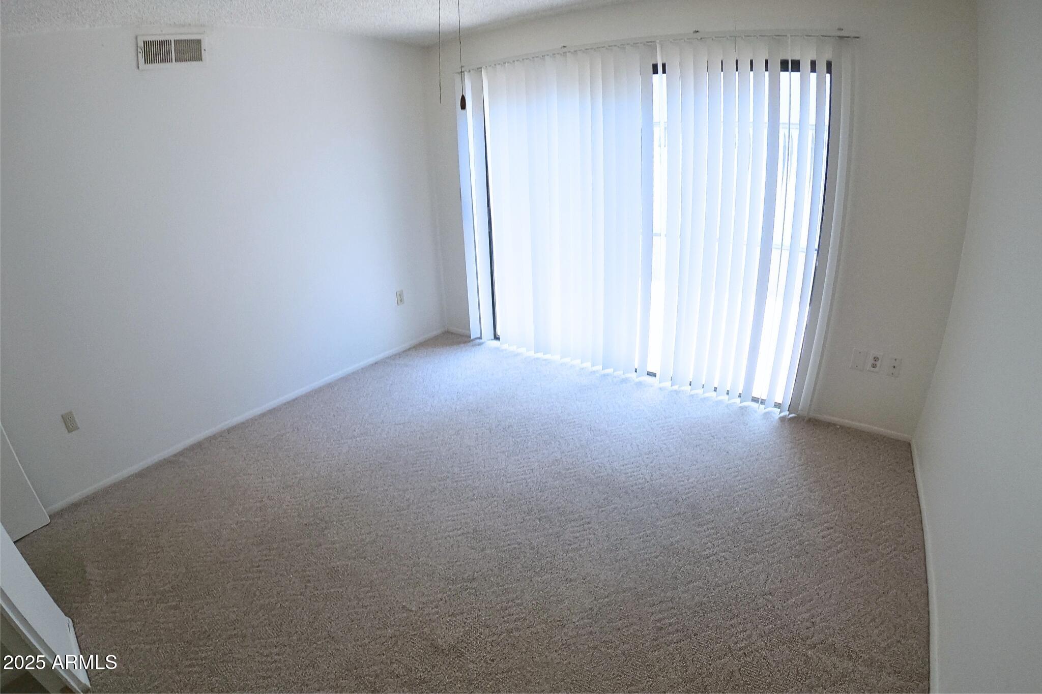 828 East Junction Street, Unit 832 Apache Junction, AZ 85119 - Photo 8 of 17 a view of empty room