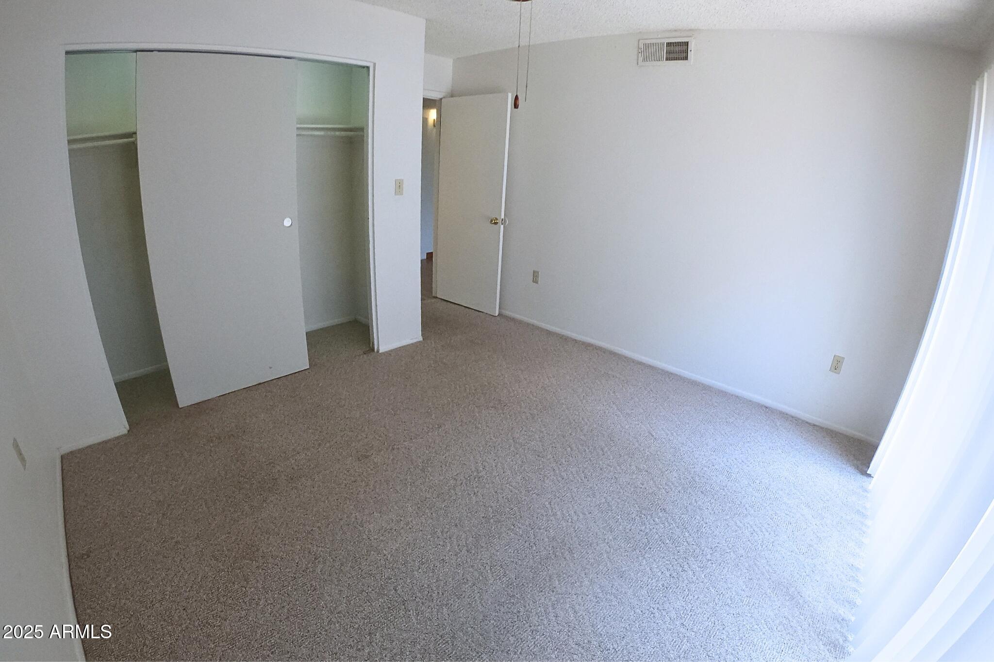 828 East Junction Street, Unit 832 Apache Junction, AZ 85119 - Photo 9 of 17 a view of a room with an empty space