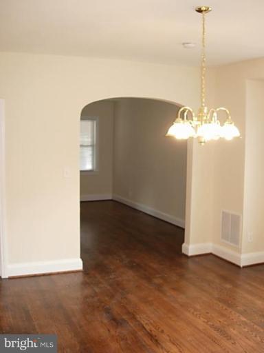 3718 Woodridge Road Baltimore, MD 21229 - Photo 8 of 18 a view of a room with wooden floor