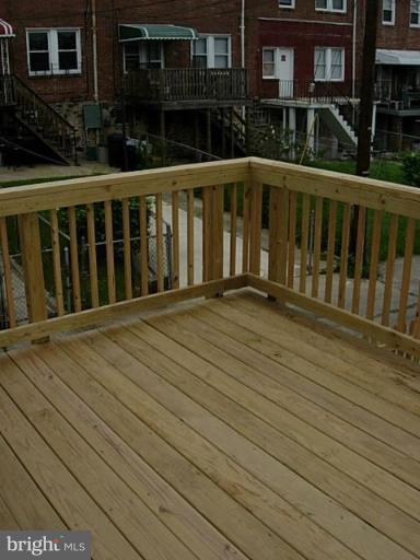 3718 Woodridge Road Baltimore, MD 21229 - Photo 10 of 18 a view of wooden deck