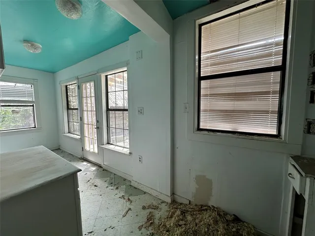 a view of a room that has a window