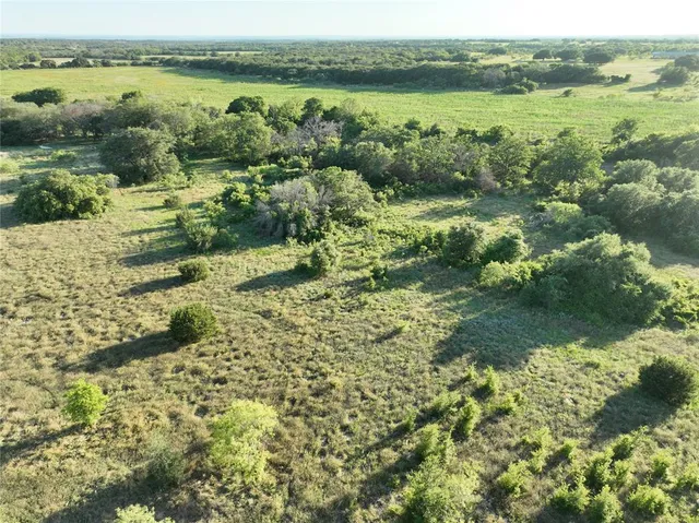 a view of lake with green space