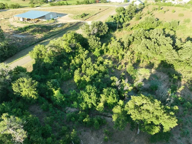 a view of a yard with an outdoor space