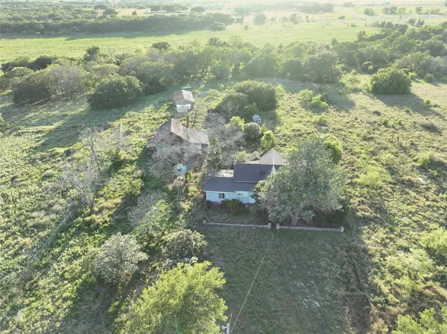 a view of lake with green space