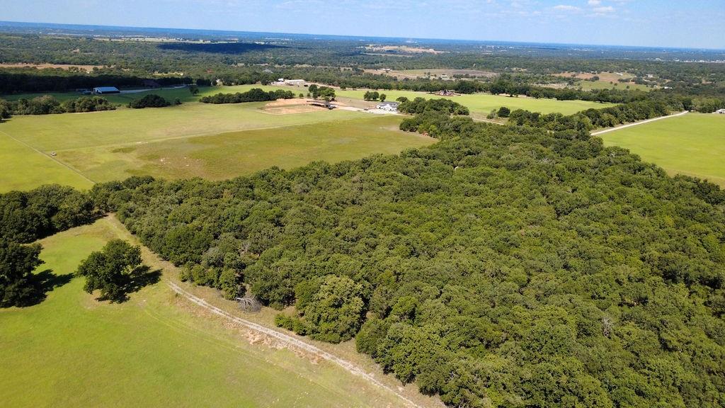 4475 Lazy Bend Road Millsap, TX 76066 - Photo 5 of 19 a view of a city with an ocean view