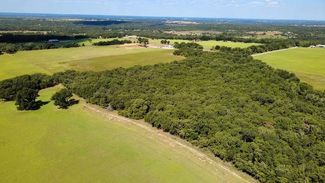 a view of an ocean and mountain